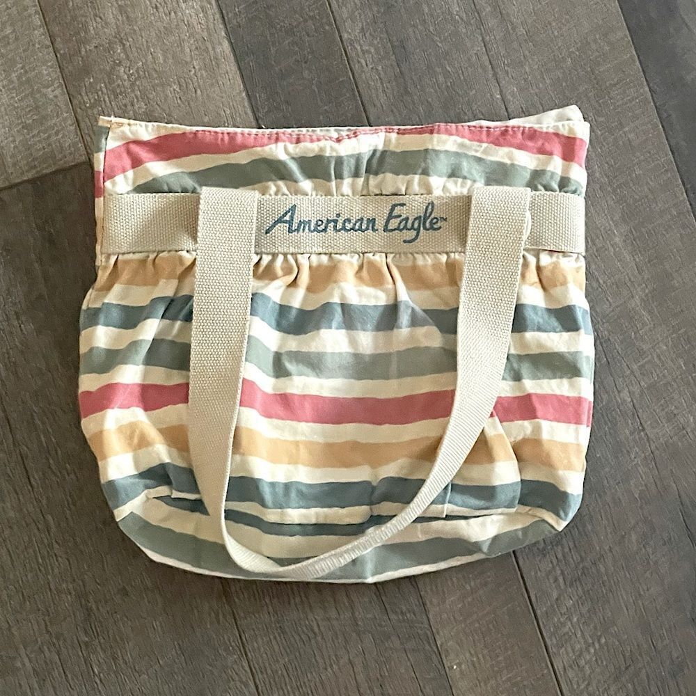 American Eagle Striped Bag. 14 x 10.5 inches, multiple pockets.